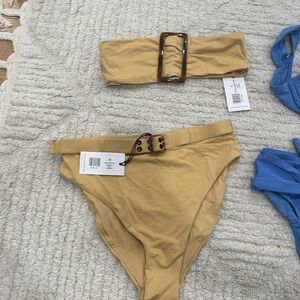 We wore what bikini size small top and medium bottom selling as set new w/ tags